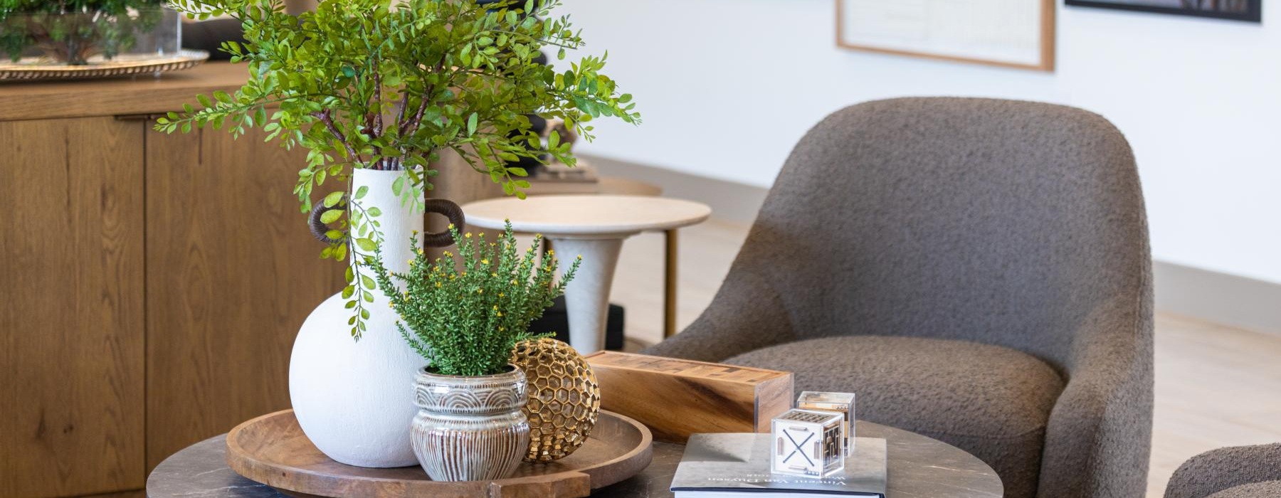 a chair and a table with plants on it